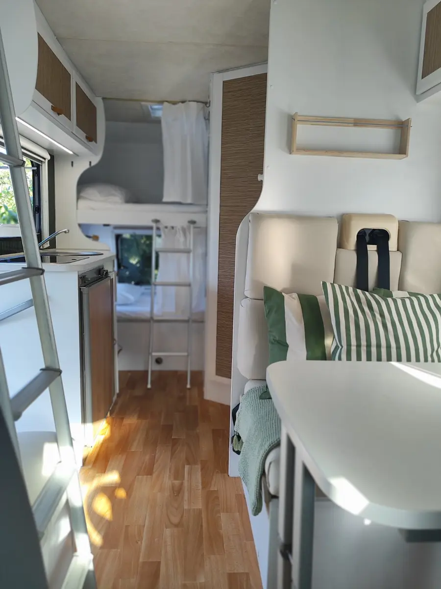 Interior aisle, kitchen and sleeping areas